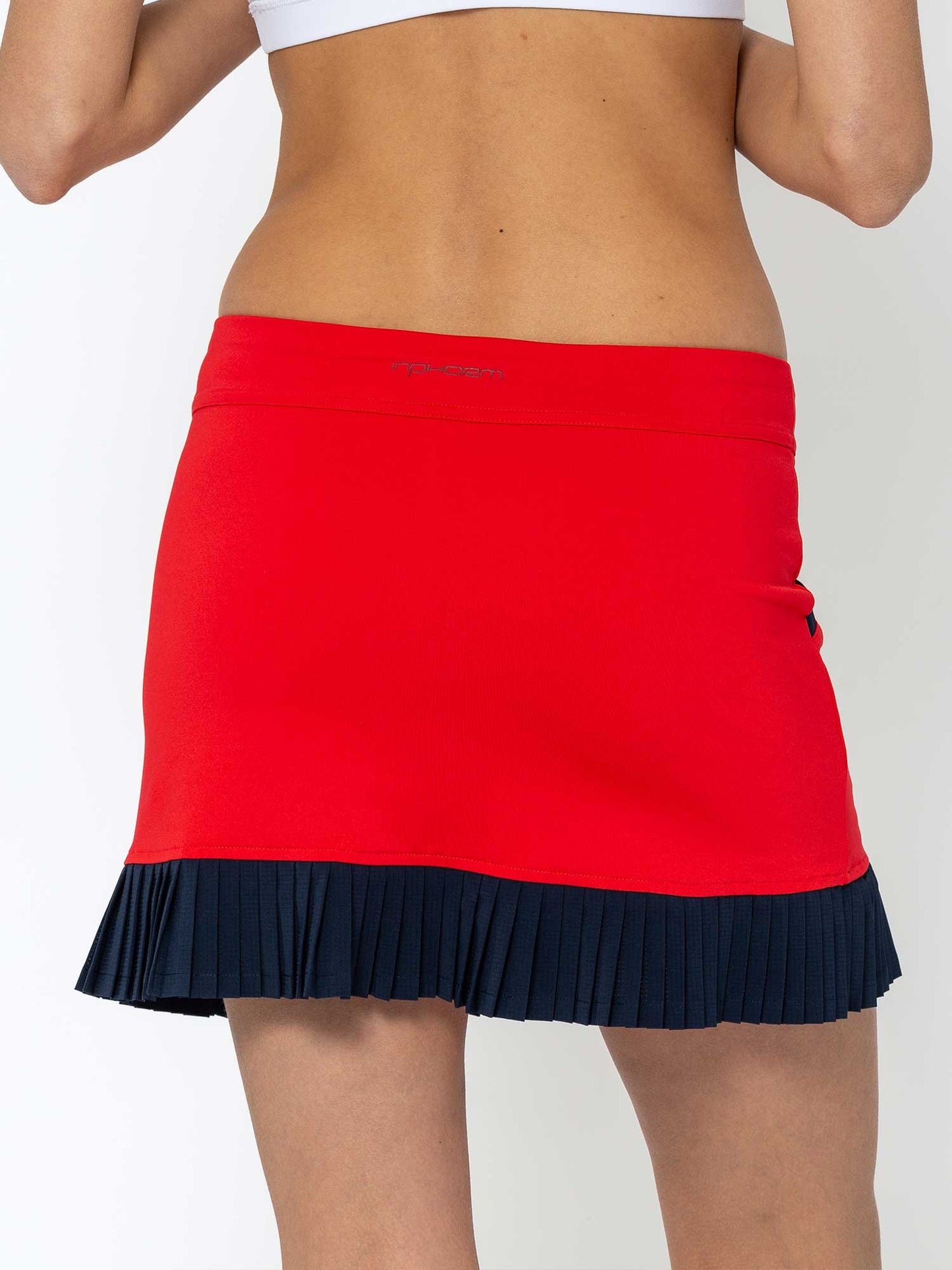 Kai 17" Pleated Skirt - Poppy/Midnight - The Golf Guys Online